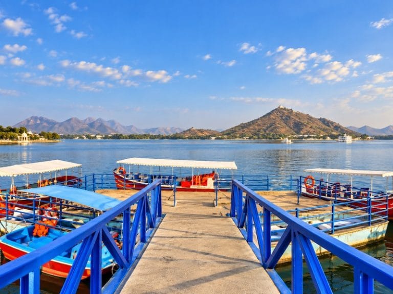 Udaipur Monuments & Attractions Fateh Sagar Lake Udaipur with boats and Aravalli Hills