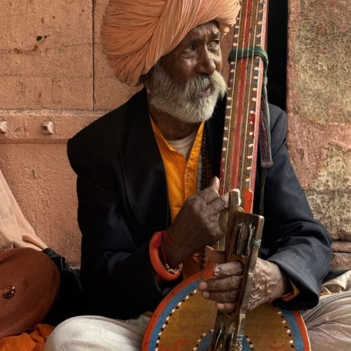 Traditional Rajasthani musician encountered during a Jaipur cultural walk