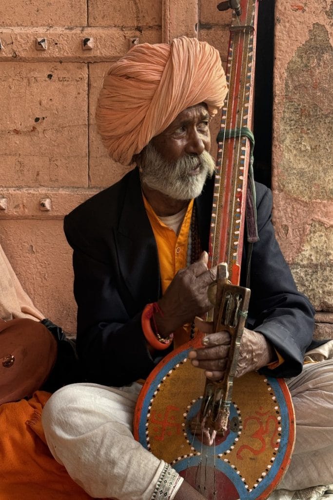 Traditional Rajasthani musician encountered during a Jaipur cultural walk