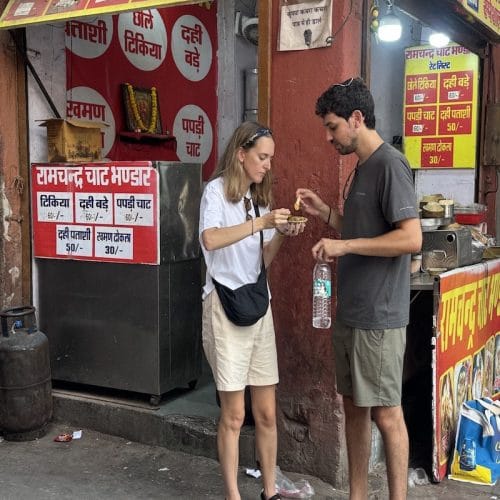 Guests tasting local street food during a Jaipur food tour
