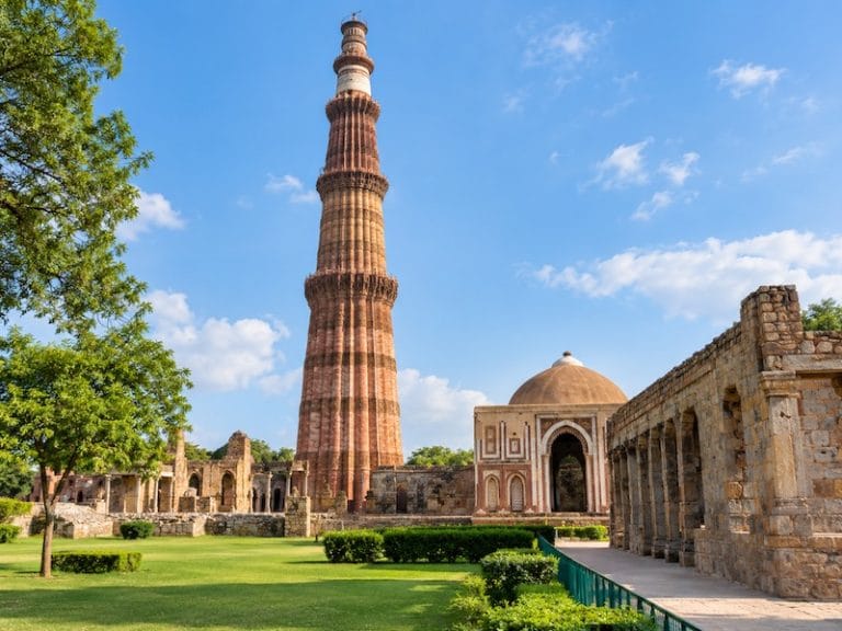Delhi Monuments & Attractions Qutub Minar in Delhi, India, historic minaret and UNESCO World Heritage Site