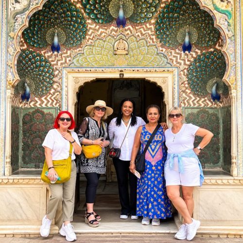 Travellers at the Peacock Gate in City Palace Jaipur during a Rajasthan tour